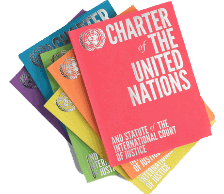 copies of the UN charter in a pile