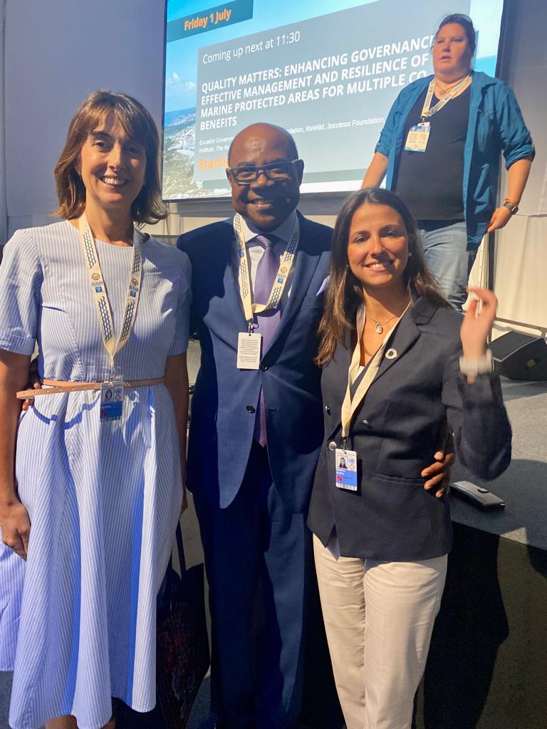 Rita stands to the right of Hon. Edmund Bartlett, minister of Tourism Jamaica and Carolina Mendorca, Azores Destination Management Organisation. Edmund stands in the centre with his arms around Rita and Carolina, all smile to camera.